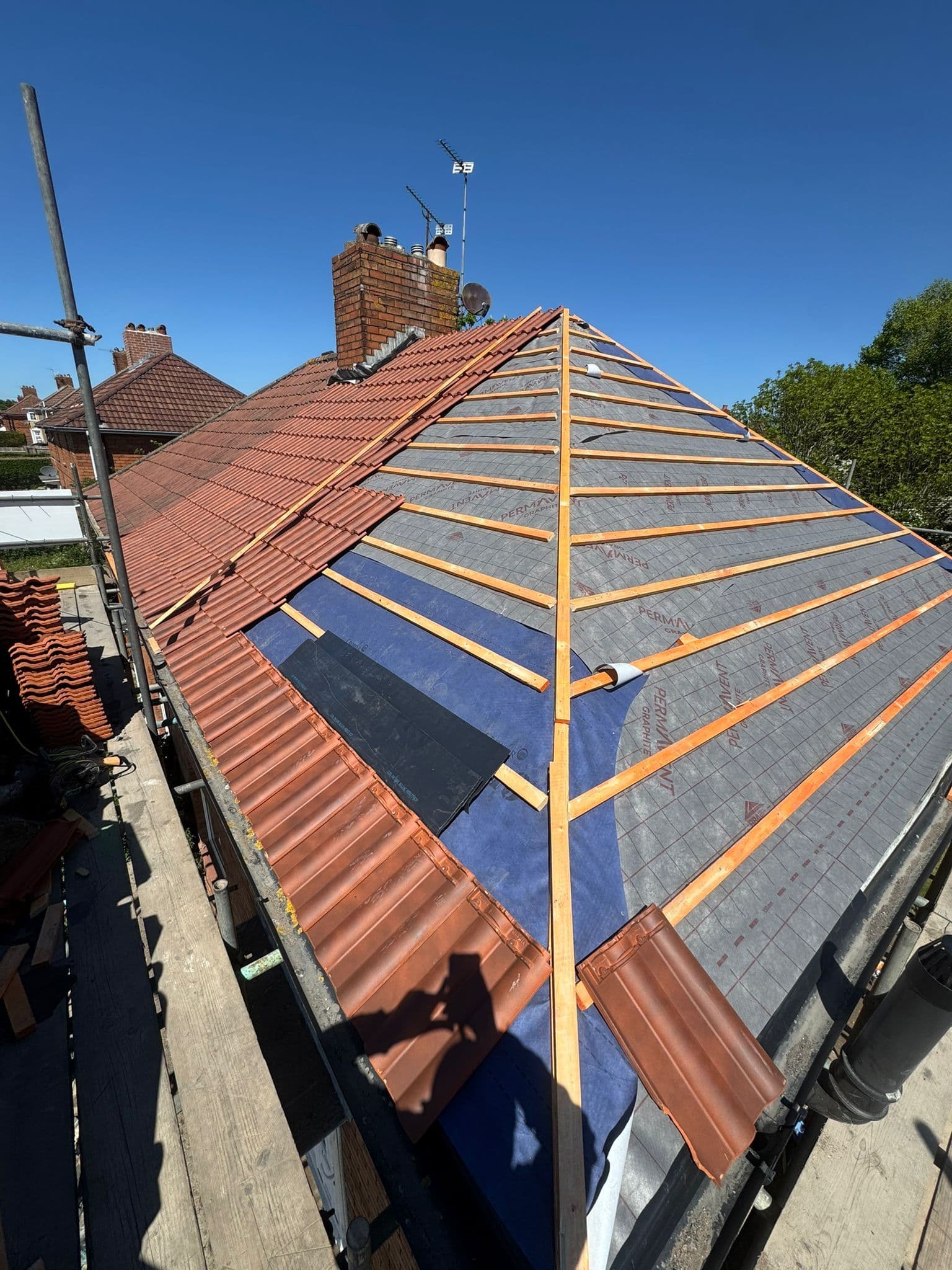 Completed roof replacement job by Southwest Driveways & Roofing